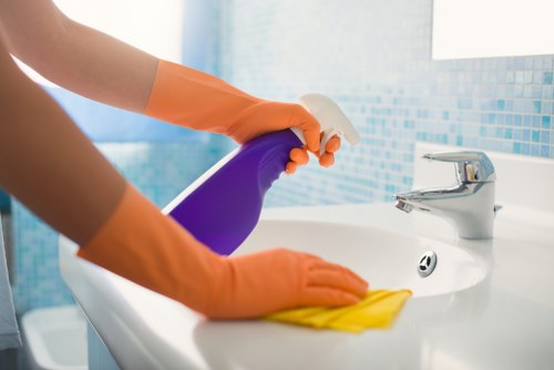 Professional Hackney cleaner working in a home environment